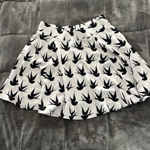 Zip back sparrow mini skirt